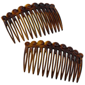 Camila Paris front packaging showing two tortoise shell side combs and decorative finish