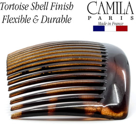Camila Paris comb in a bun demonstrating secure updo hold without pins
