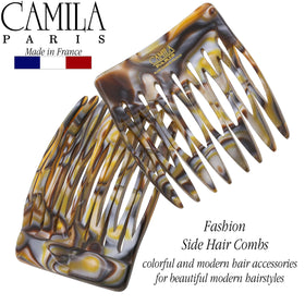 Camila comb next to a coin illustrating small 1.5-inch scale and travel convenience