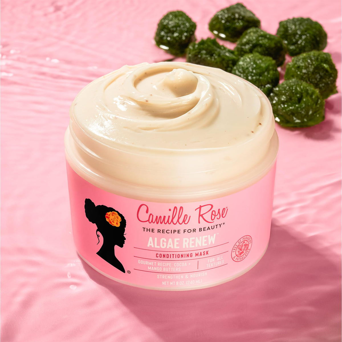 Camille Rose being applied to textured hair for detangling and moisture