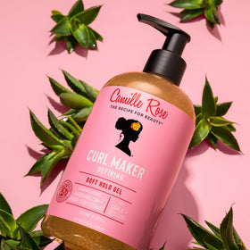 Camille Rose being applied to wet hair for detangling and defined curls
