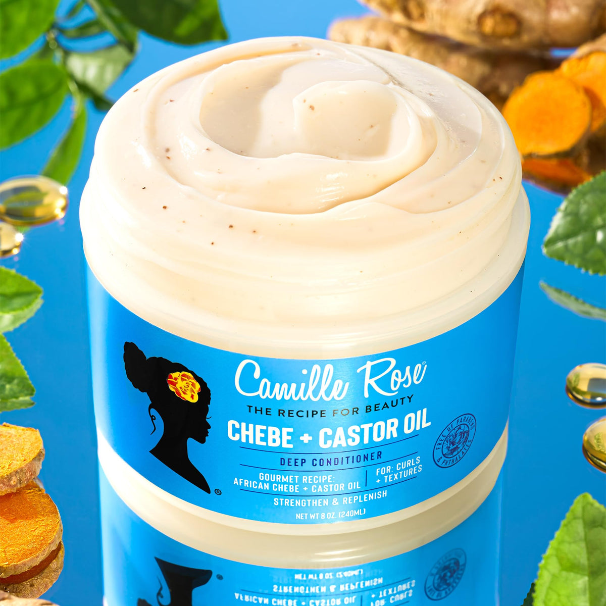 Camille Rose Chebe powder and ingredients arrangement highlighting traditional strengthening benefit