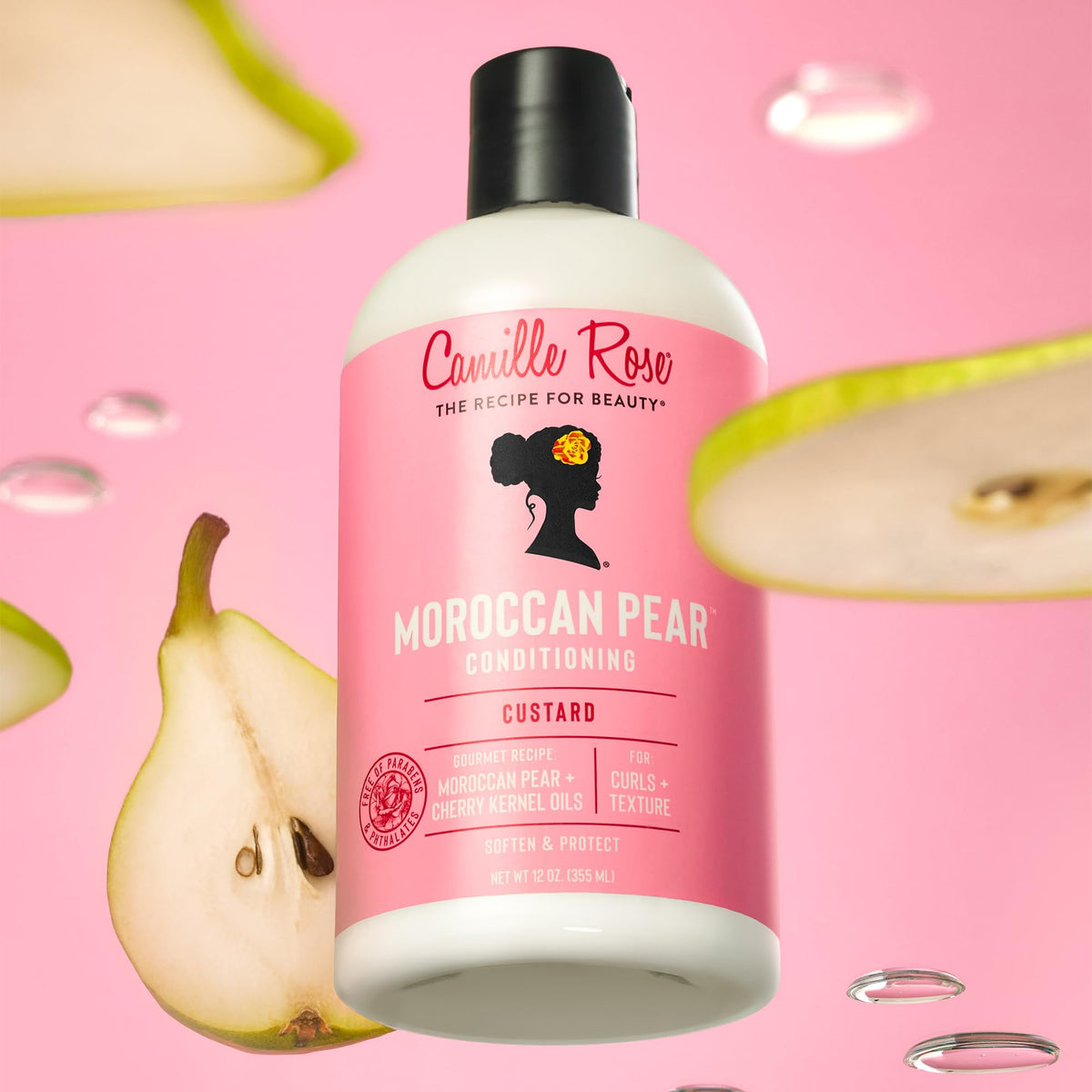 Camille Rose in-use image applying conditioner in shower for smoother detangling