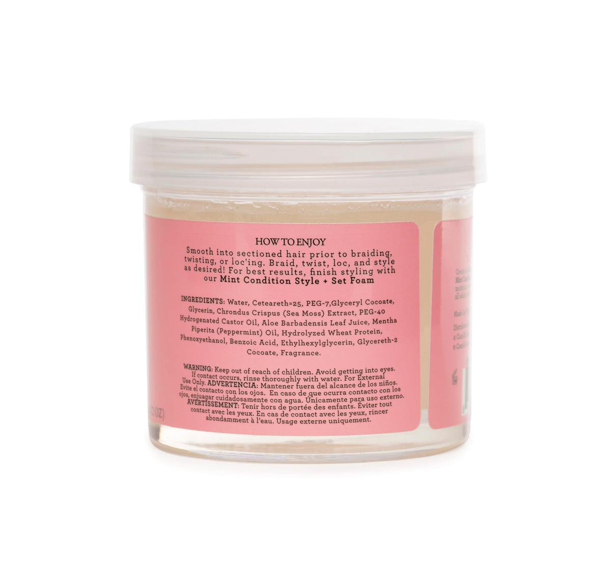 Camille Rose 12 oz jar next to a hand for scale to show practical size for home use