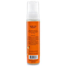 Camille Rose foam texture dispensed on hand showing lightweight airy hold