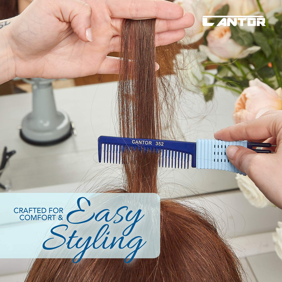Cantor comb beside hand for scale demonstrating compact, easy-to-carry size