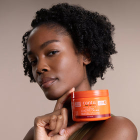 Cantu application on wet curls showing improved curl clumping and softness