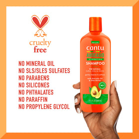 Cantu shampoo being applied to curly hair showing reduced frizz and improved manageability