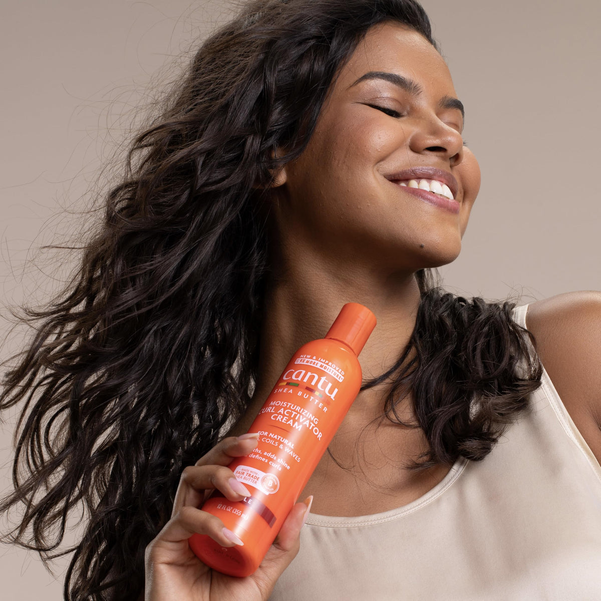 Cantu before and after image highlighting defined curls benefit