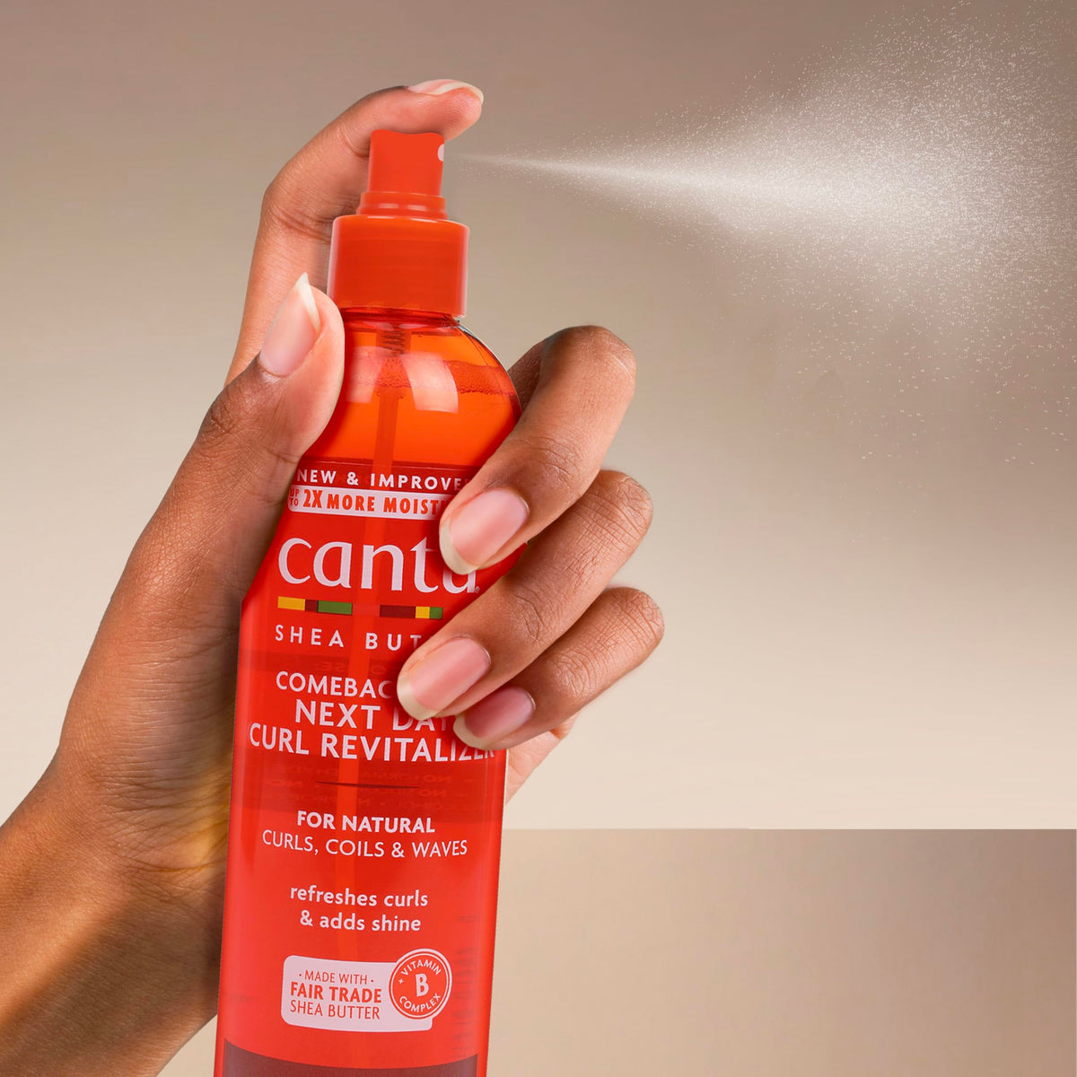 Cantu on loose waves showing enhanced shine and reduced frizz