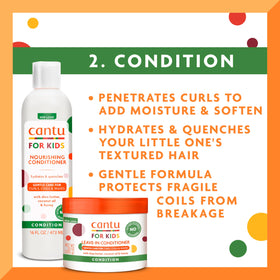 Cantu detangler spraying mid-action promoting easier combing and less breakage
