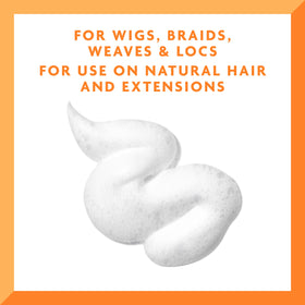 Cantu applied to braided style reviving shine and reducing dryness