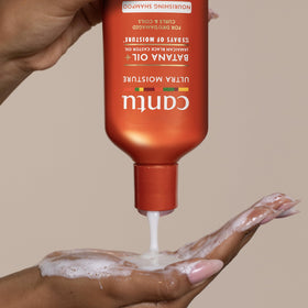Cantu 13 fl oz bottle next to common objects showing true size and convenience