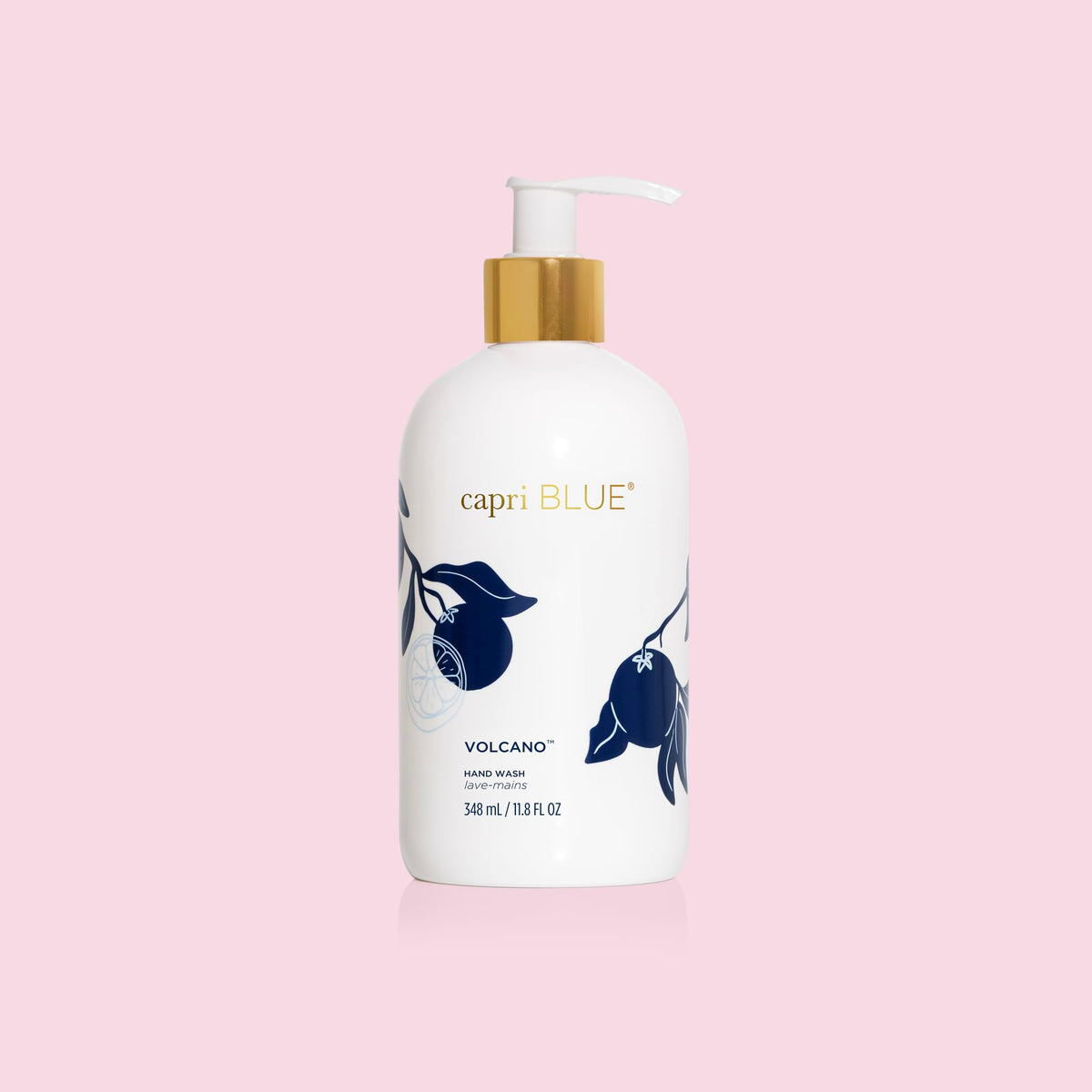 Capri Blue refill bottle beside pump for recycling, encourages refill reuse and waste reduction