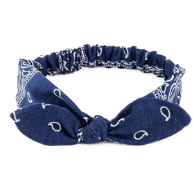 Carede close-up of removable rabbit ears knot, shows styling versatility