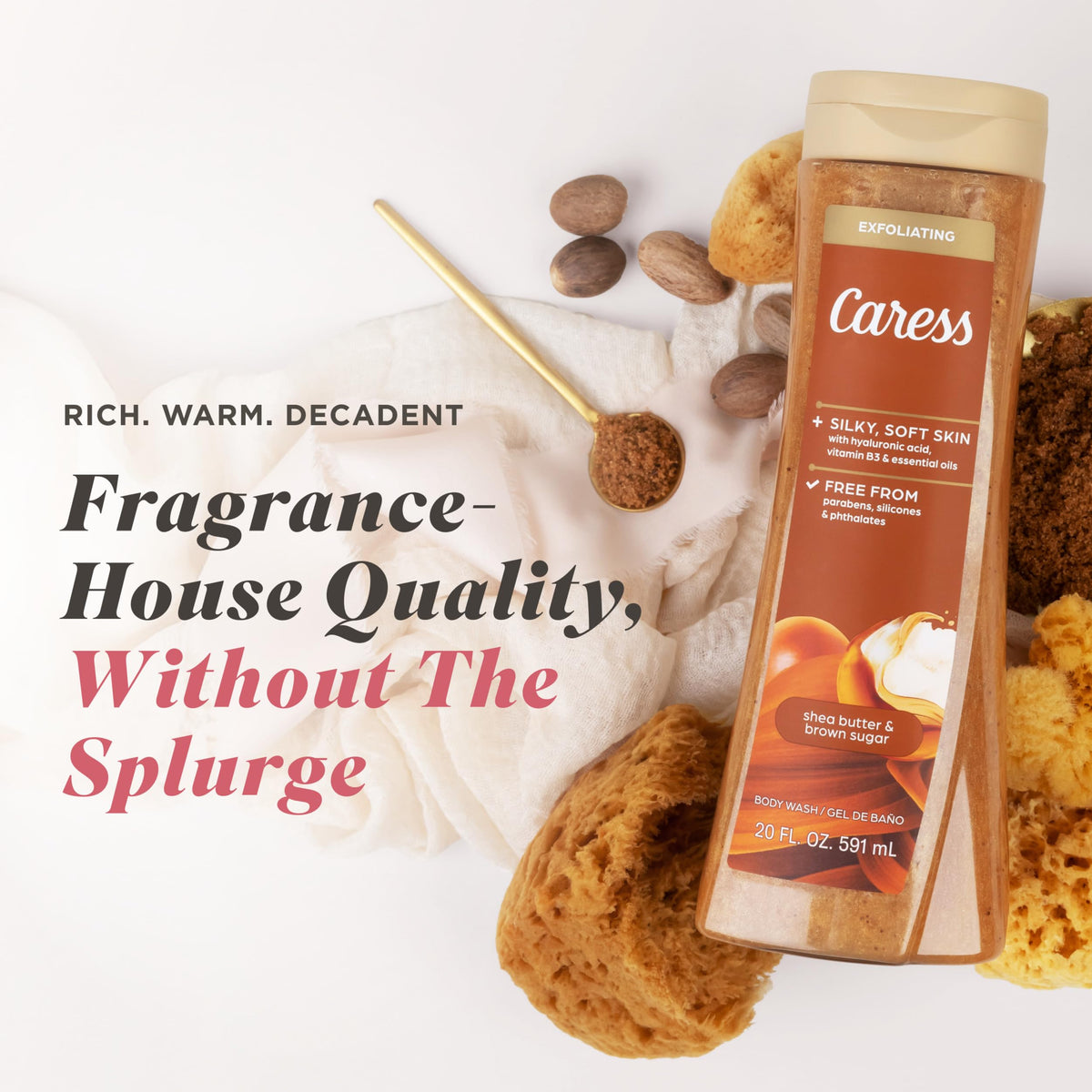 Hand holding Caress rich lather foam to demonstrate moisturizing feel