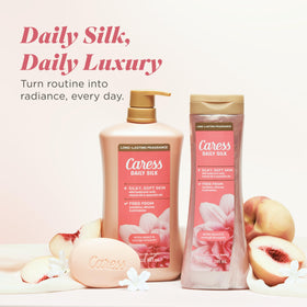Caress scent notes visual of white peach and orange blossom for lasting fragrance