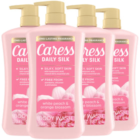 Caress bottle front packaging showing white peach scent and vibrant benefit