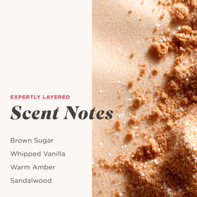 Pouring Caress body wash into a loofah for exfoliating and hydrating cleanse
