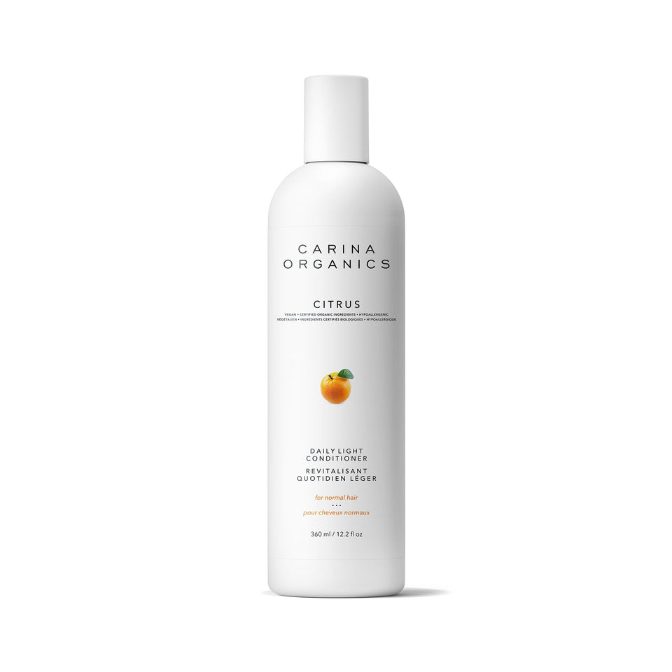 Carina Organics conditioner front packaging showing label and citrus scent, promises lightweight hydration