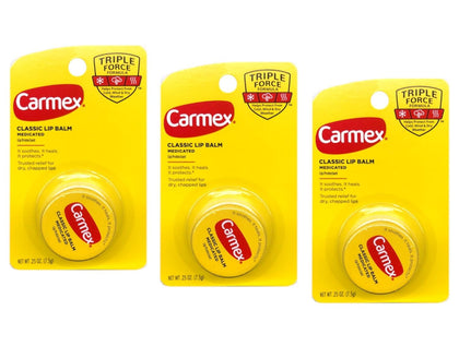 Carmex front packaging showing three medicated lip balm sticks and benefits