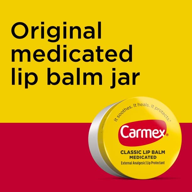 Carmex tucked in a purse pocket showing travel-ready everyday carry