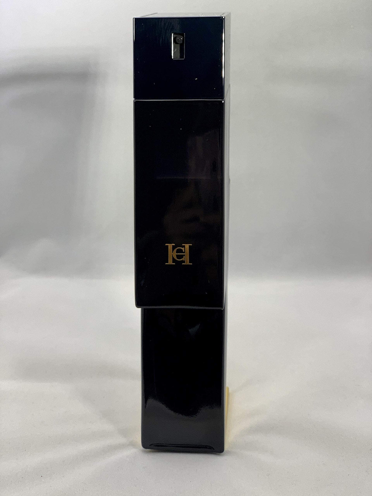 Carolina Herrera Bad Boy spray in use demonstrates confident application and projection
