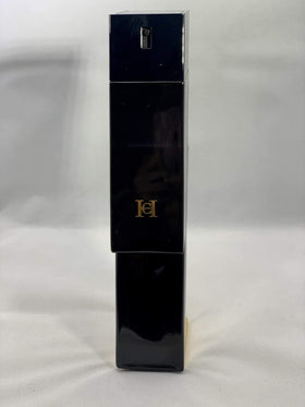 Carolina Herrera Bad Boy spray in use demonstrates confident application and projection