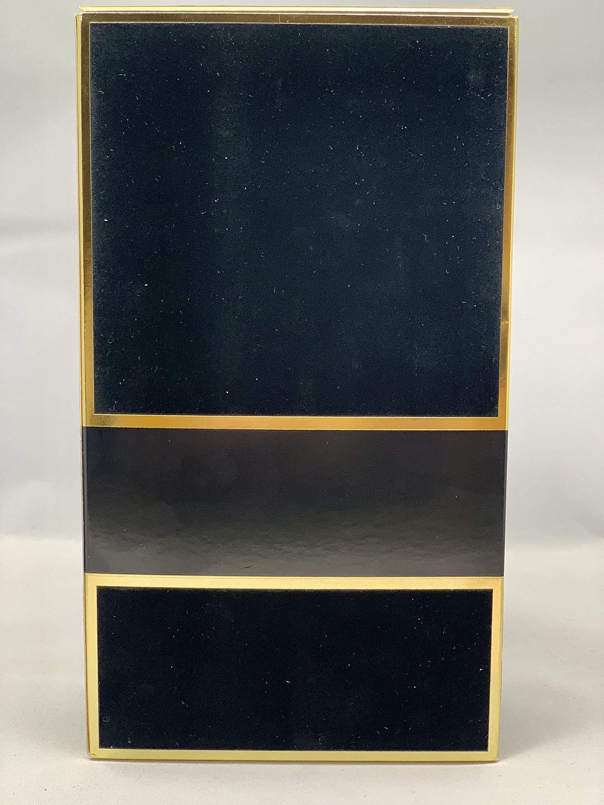 Carolina Herrera Bad Boy glass finish texture closeup shows refined craftsmanship and grip
