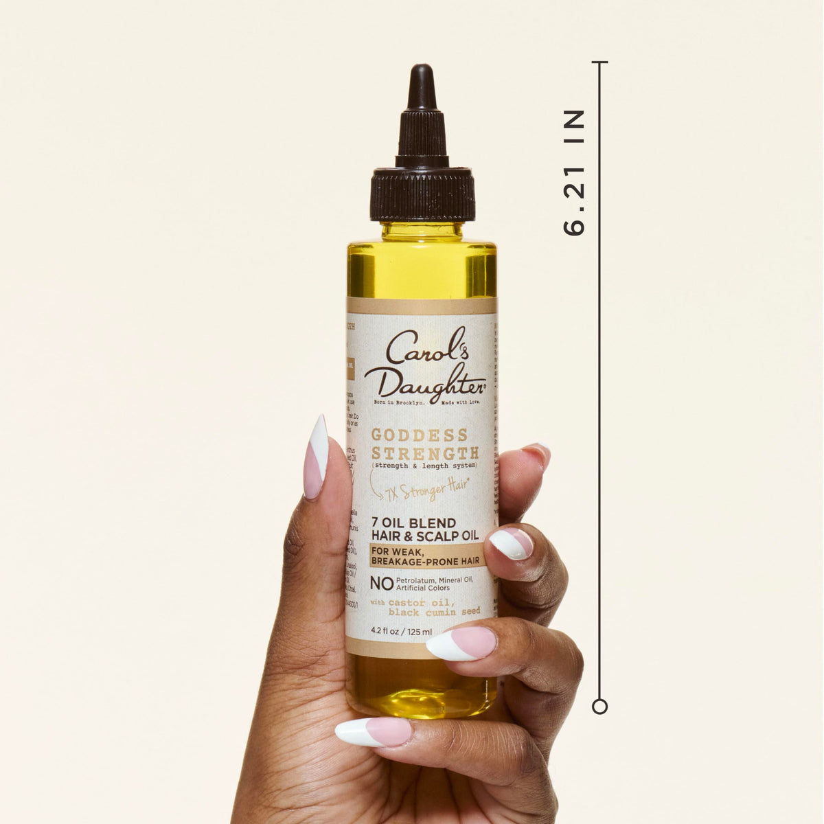 Carol's Daughter applicator tip close-up for precise scalp application benefit