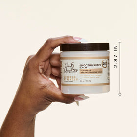 Carol's Daughter creamy balm texture close-up emphasizing smooth application