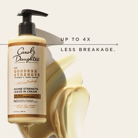 Carol's Daughter detangling action with wide-tooth comb showing smoother, more manageable strands