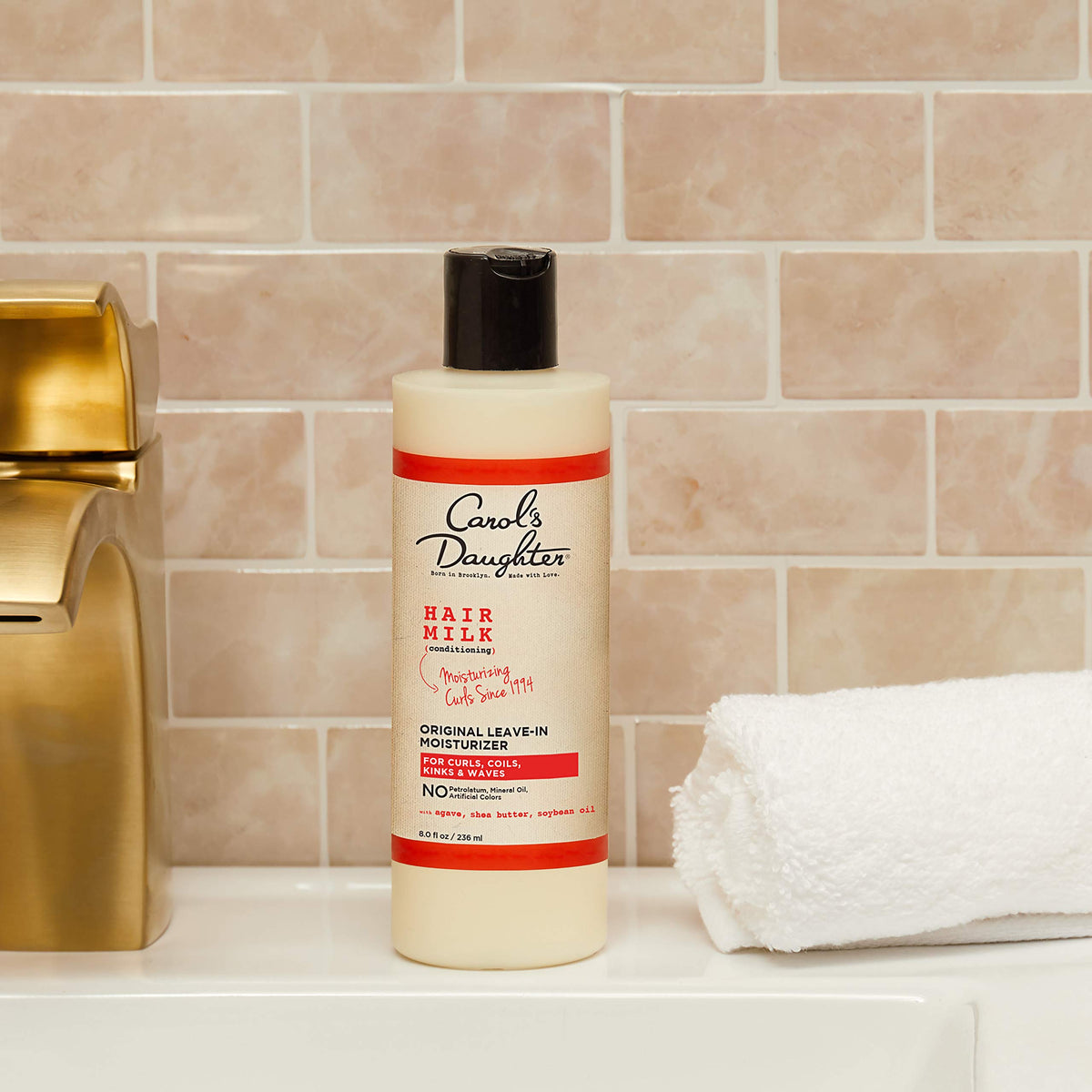 Carol's Daughter in-shower use to lock moisture after co-wash