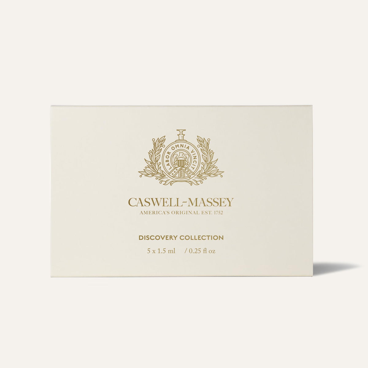 Caswell-Massey Distiller’s Lounge spray in use suggesting warm, evening depth