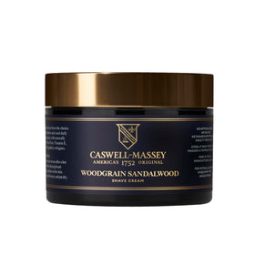 Caswell-Massey front tube showing Heritage Woodgrain label and classic design benefits