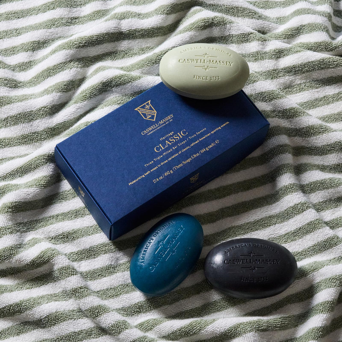 Caswell-Massey Greenbriar bar lather close-up showing creamy foam and moisturizing benefit