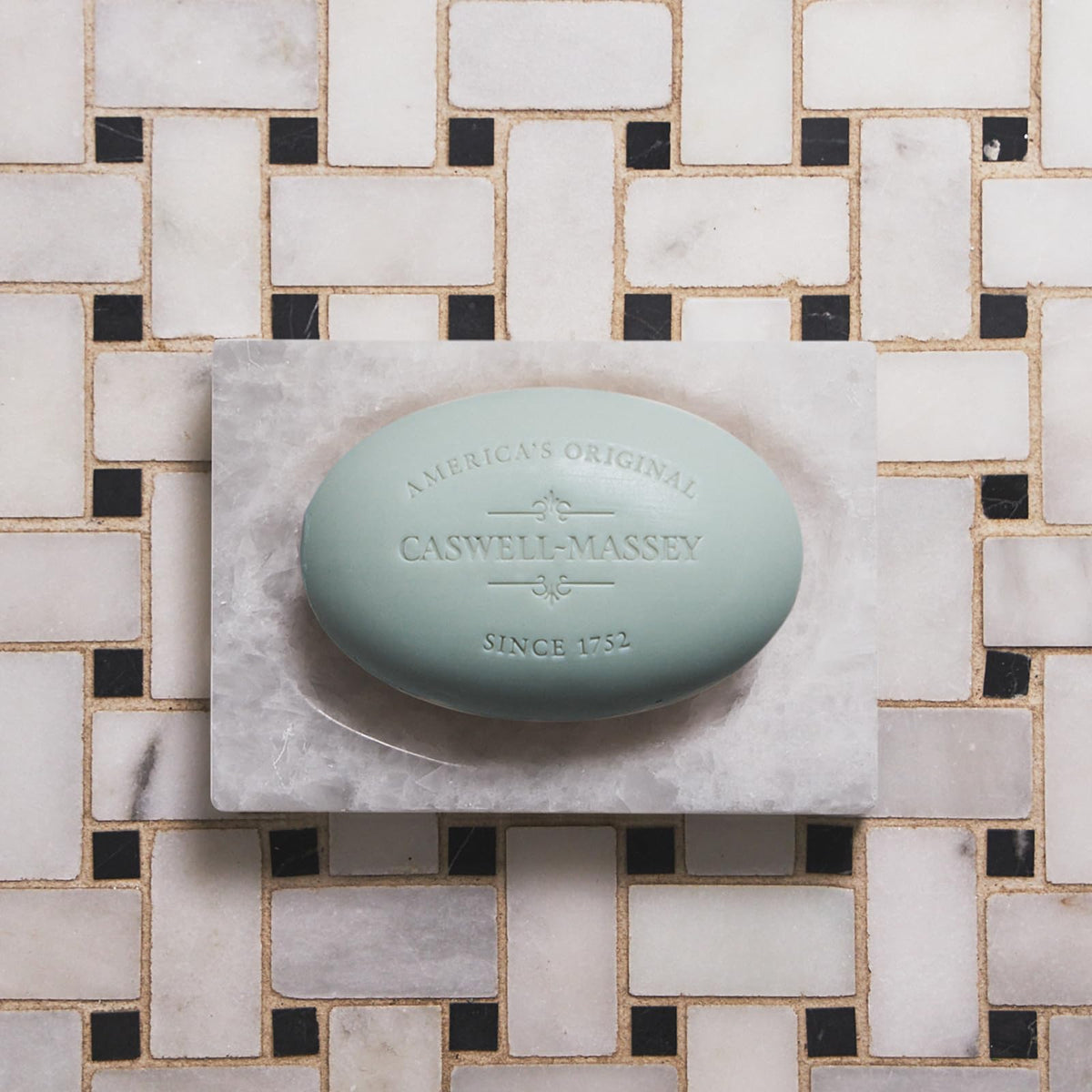Caswell-Massey rich foam lather in hand demonstrating moisturizing performance