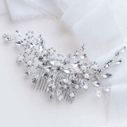 Catery bridal hair comb front view showing silver rhinestones and floral design for elegance