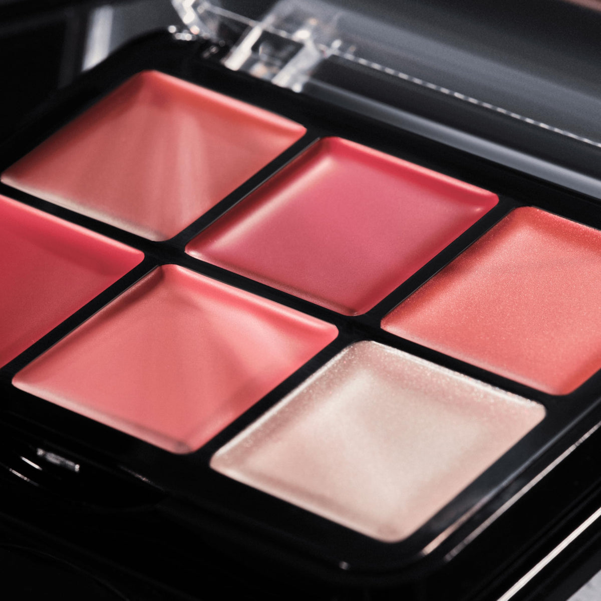 Catrice Cosmetics palette beside essentials conveying quick touch-up convenience