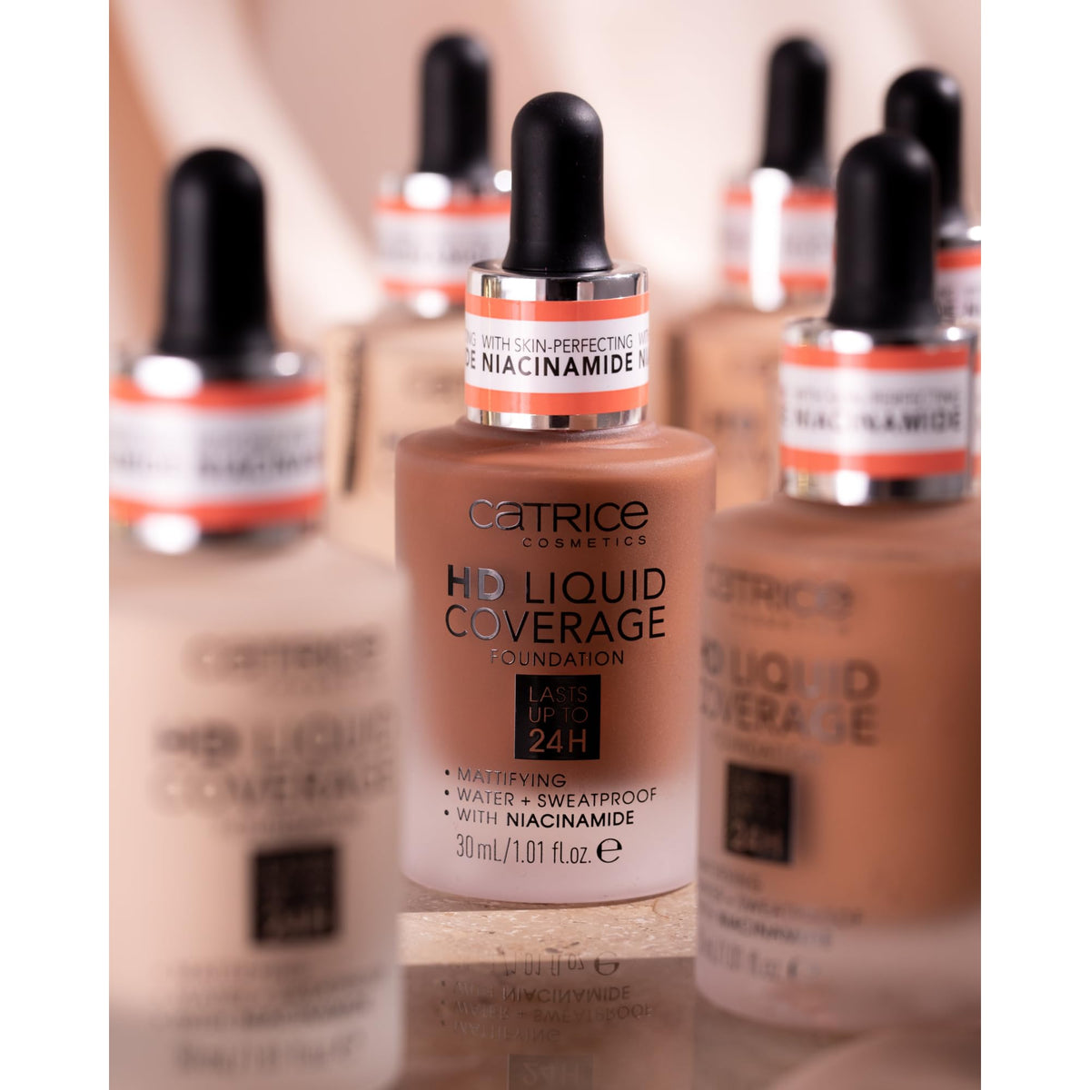 Catrice bottle by window light demonstrating true-color payoff and benefit