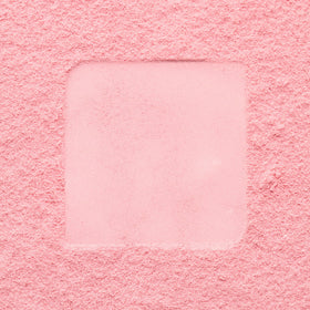 Catrice compact inside a makeup bag emphasizing easy-to-carry everyday convenience
