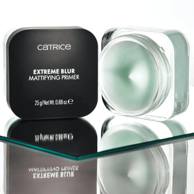 Catrice tube next to coin illustrating compact size for travel convenience