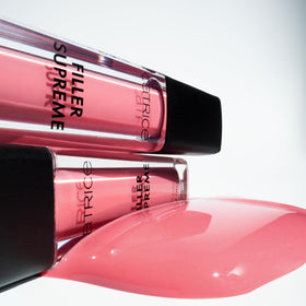 Catrice lips on model showing glossy, plumping look and softened lines benefit