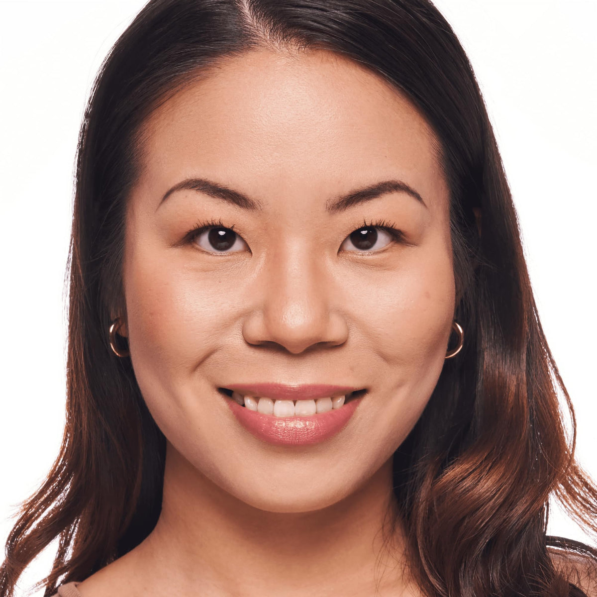 Catrice foundation on model in natural light showing airbrushed complexion benefit