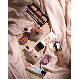 Catrice bottle on vanity with bag showing everyday carry and convenience benefit