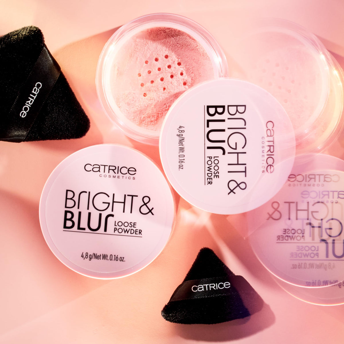 Catrice lifestyle flatlay with powder in a makeup bag for travel-ready beauty benefit
