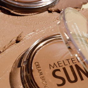 Catrice tube next to coin for size comparison and travel-friendly benefit