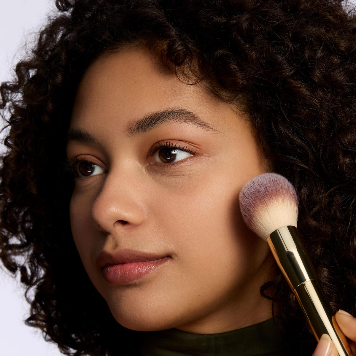 Catrice under-eye application demonstrating creasing prevention and brightening benefit
