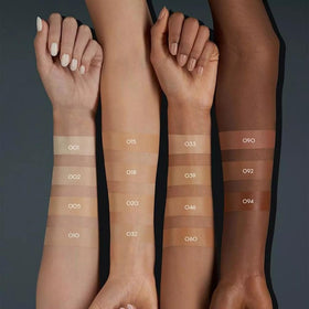 Catrice shade comparison on arm with scale, shows true vanilla tone for matching