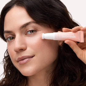 Catrice applied under-eye on model illustrating immediate brightening effect